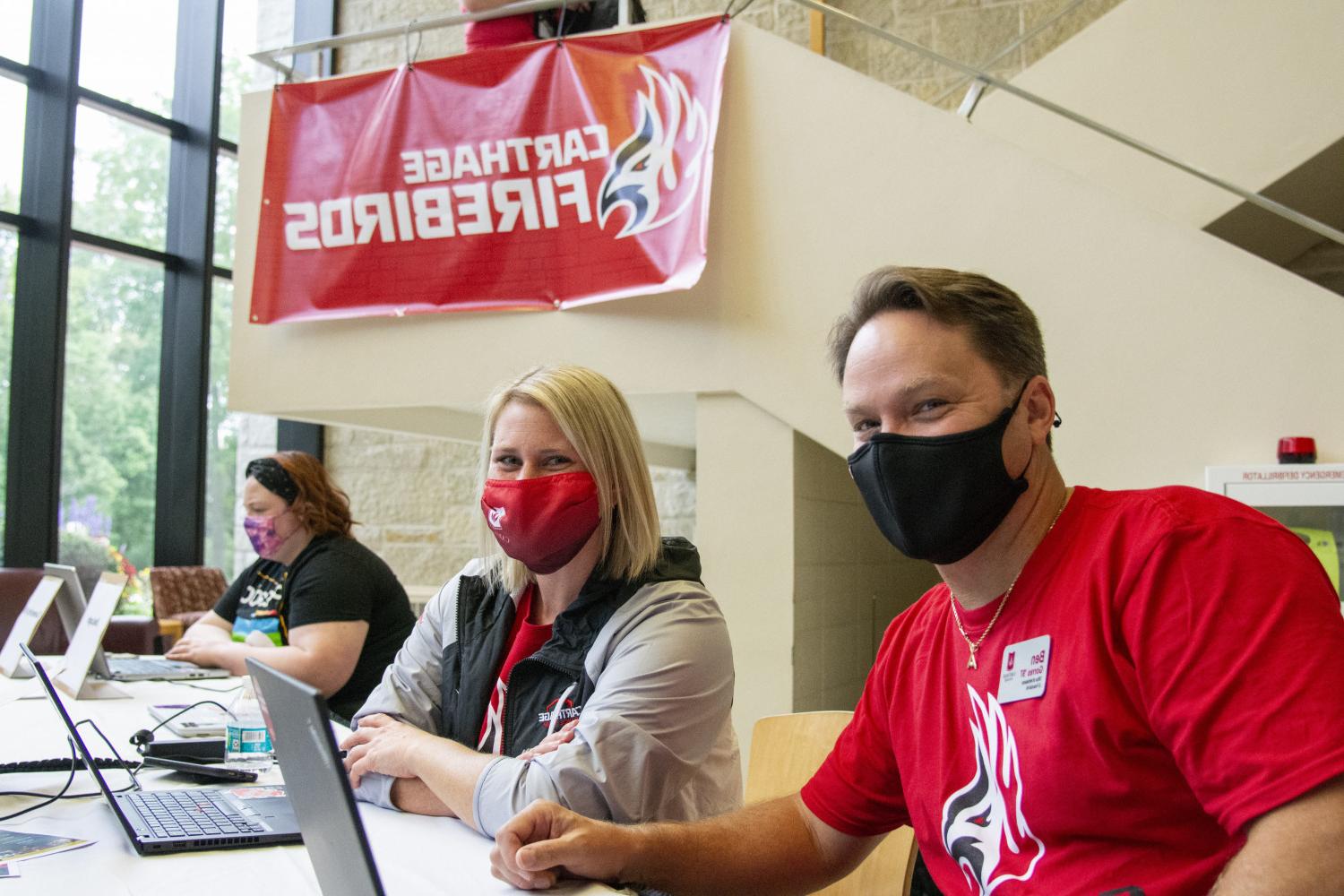 Members of the Admissions team welcome Carthage's newest Firebirds to campus during New Student O...